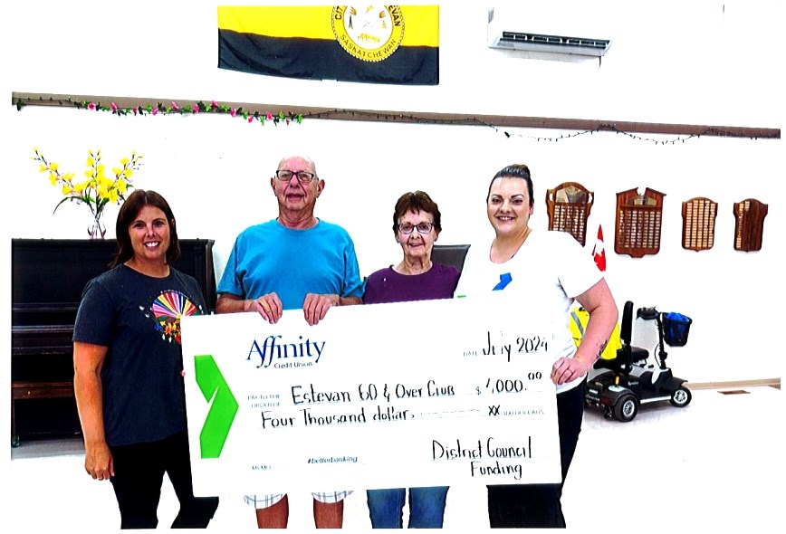 Participating in a donation from Affinity Credit Union to the 60-and-Over Club were, from left, Tannis Collins with Affinity, club secretary Gary St. Onge, president Darlene Sylvester and Affinity representative Alisha Keturakis. 