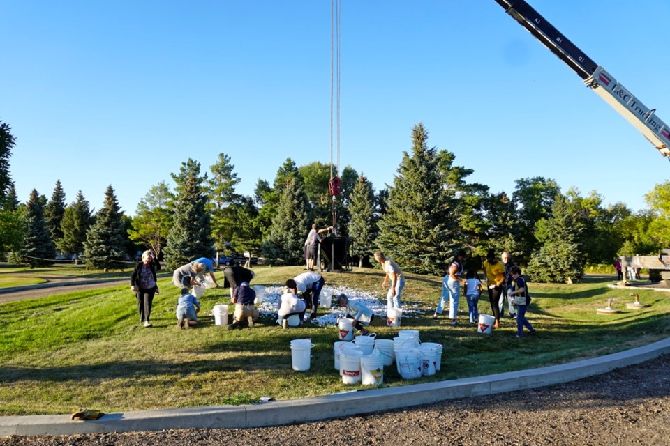 Rotary club members picked up the ball, which will be stored until the next year's fundraiser finale in Weyburn.                                