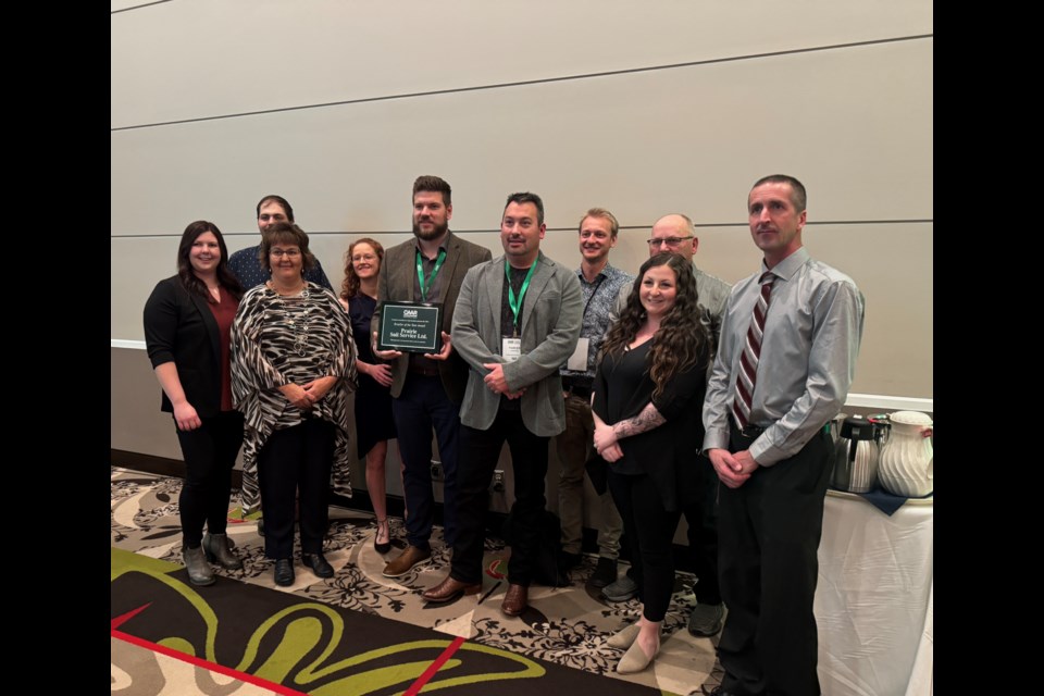 Team members from Prairie Soil Services in Norquay accept 'Retailer of the Year' Award at the Canadian Association for Agri-Retailers annual convention.