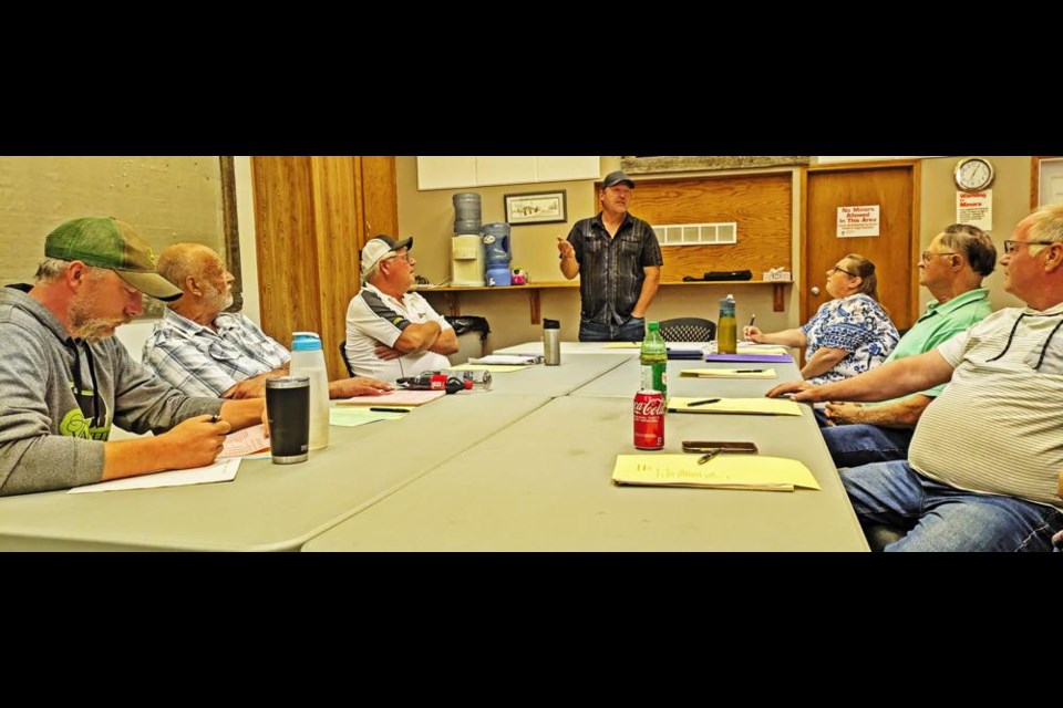 The RM of Griffin council convened in the Griffin Rec Centre on Tuesday night, and Reeve Stacey Lund (centre) stood to address the large crowd of ratepayers present to talk about the proposed wind turbines.