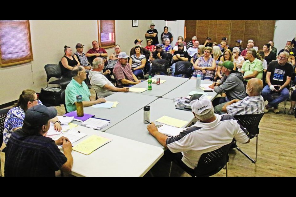 The RM of Griffin council interacted with the large crowd of ratepayers who voiced their concerns and opposition to the Enbridge wind turbines, at a meeting over the summer.