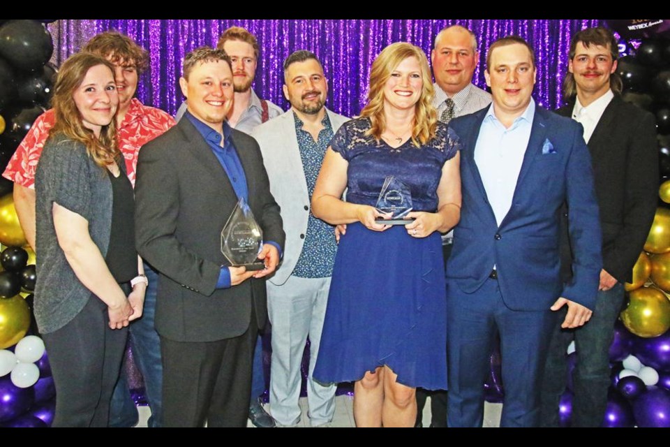 The owners and staff of MegaDry Disaster Restoration gathered for a photo with the trophies for New/Expanded Business, and Weyburn's Business of the Year, at the WEYBEX Awards on Friday night.