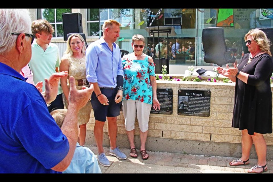 WIth his family gathered around, Curt Minard saw the plaque unveiled on the Walk of Fame in 2023.