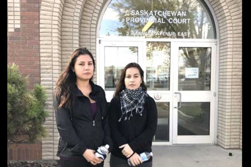  Tiki Laverdiere's two sisters at Jesse Sangster's preliminary hearing in North Battleford Provincial Court in October 2020. 