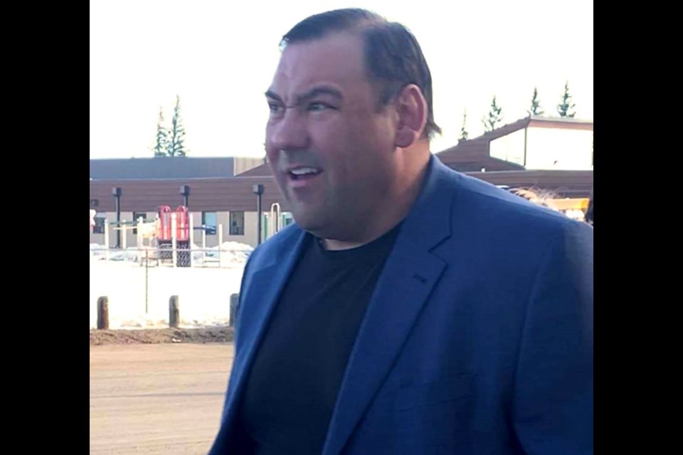 Travis Levitsky arrives at Battleford Court of King's Bench Monday morning.