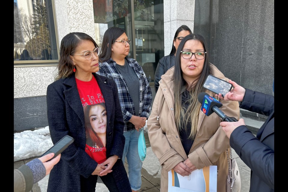 Lynea George speaks with reporters outside Regina Court of King's Bench this morning.