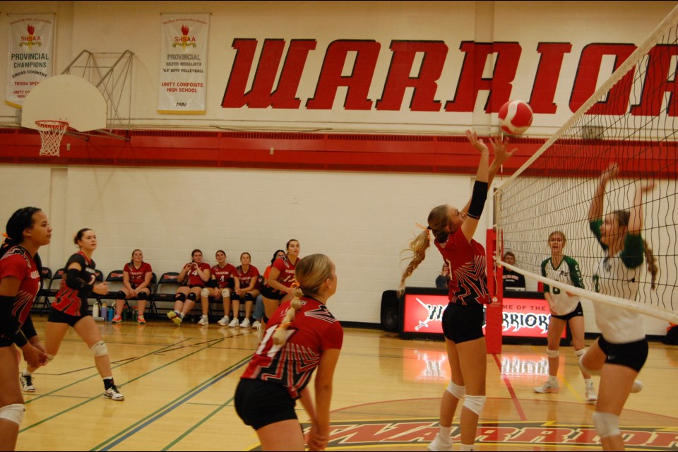 Skylar Hansen, Halle Ducherer, Casey Lewin and Maycie Gumpinger all come to help teammate Kaybree Zunti's defense during their game against the Clavet Cougars.