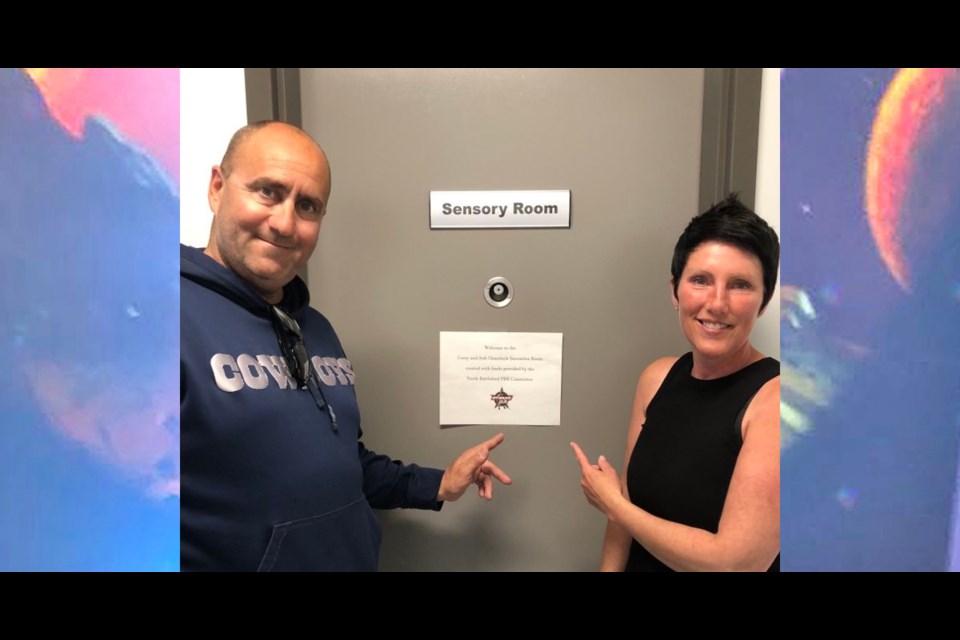 Corey and Jodi Chmelnyk and BTEC's new state of the art Snoezelen Room, named after them.