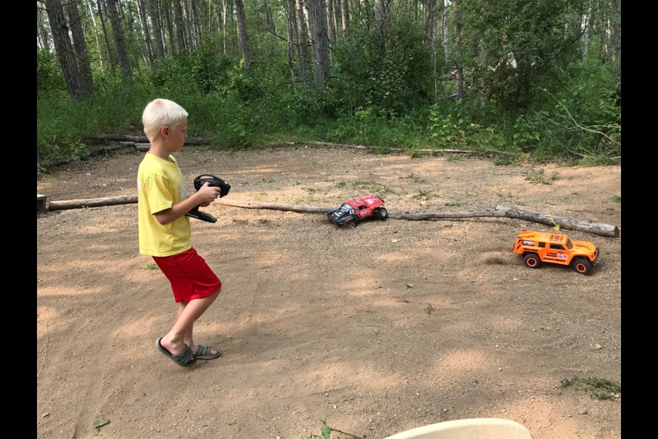 Jaxson Kurtynik had fun playing with the large remote control vehicles during his stay at Ketchen Lake Bible Camp last year,  