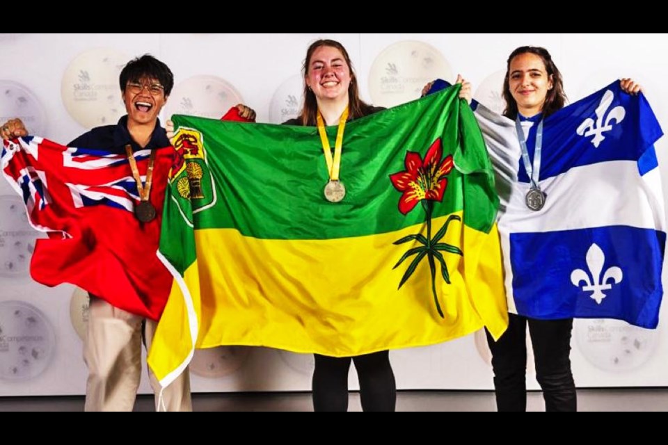 Camryn Greve of the Weyburn Comprehensive School, centre, was the gold medal winner of her category, IT Office Software Applications at the National Skills Canada competition in Quebec City, Que. At left is Zander Fernandez of Ontario, bronze medal, and at right is silver medalist Hiba Hatrouhou of Quebec.