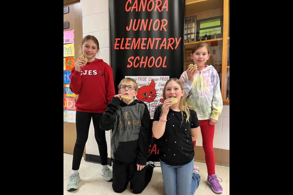 Grade 4 Student Community Council representatives enjoying their special treats, from left, were::Aliannah Herriges, Jacob Prychak, Lena Scheltgen, and Courtney Pozniak. 