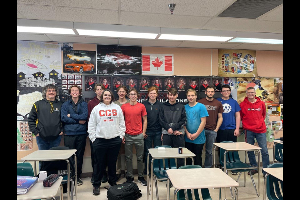 Students and lecturers involved in the Grade 11 Foundations 30 unit on Money Consumerism, from left, were: Shean Plosz (Crossroads Credit Union), Brayden Goetzinger, Lucas Latham, Ethan Curtis, Bronson Heshka, Hunter Lamb, Porter Wolkowski, Peter Michl, Brandon Harder, Michael Owchar, Josh Rock, and Thomas Lowes (teacher.)