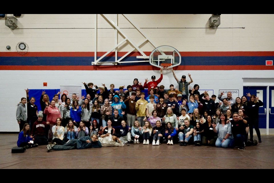 The Day 2 group of Grade 9 students posed for a picture after completing their Challenge Day.
