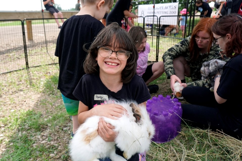 Paisley-Rose Folk visited with animals at the petting zoo during the Estevan Early Years Family Resource Centre's Kick-Off to Summer Family Party.