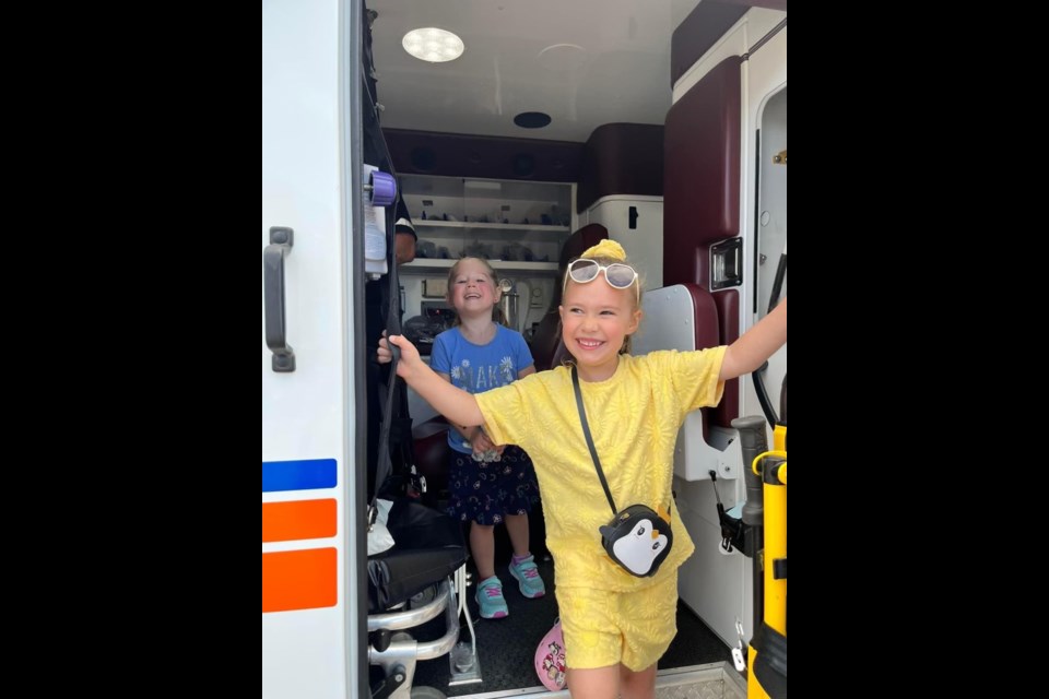 Lily Dukart and Josephine Crossman checked out the ambulance.