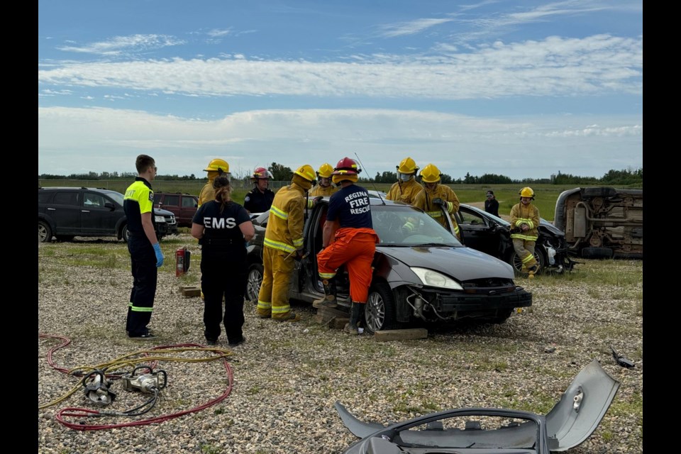 Students of both the Fire and Primary Care Paramedic programs participated in an exercise June 27 that saw the groups work together to solve the possible problems at the scene of an accident.