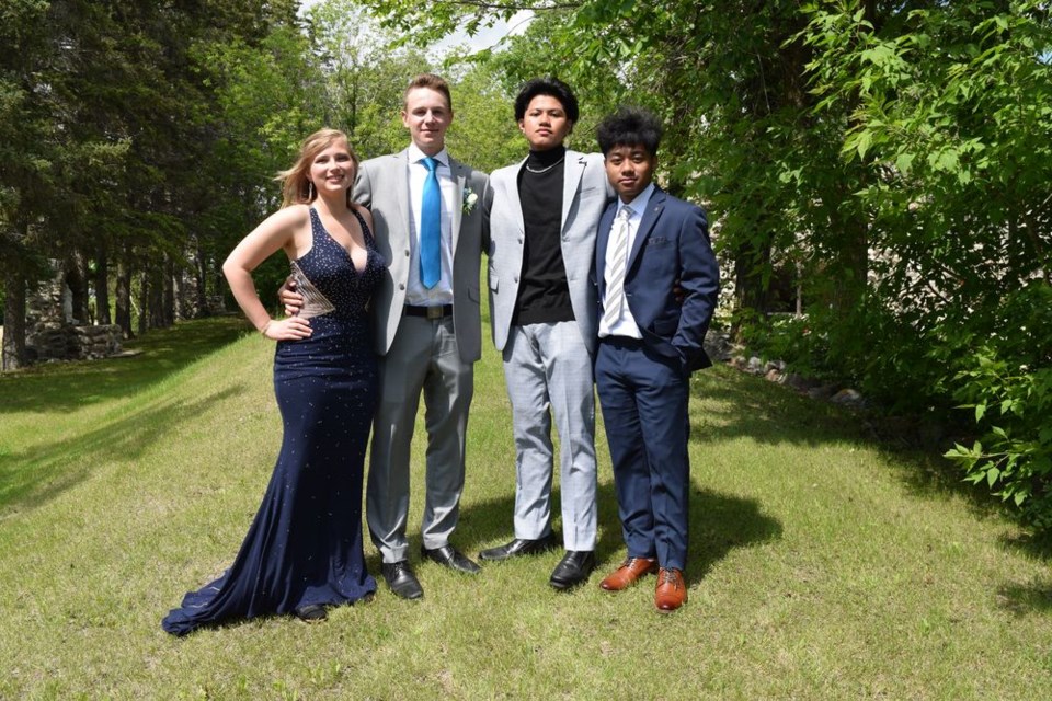 Photographed at the Grotto of Our Lady of Lourdes in Rama, the Invermay School graduating class of 2022, from left, are: Trinity Fidek, Cole Serron, Kim Villete and Ivan Marasigan. 