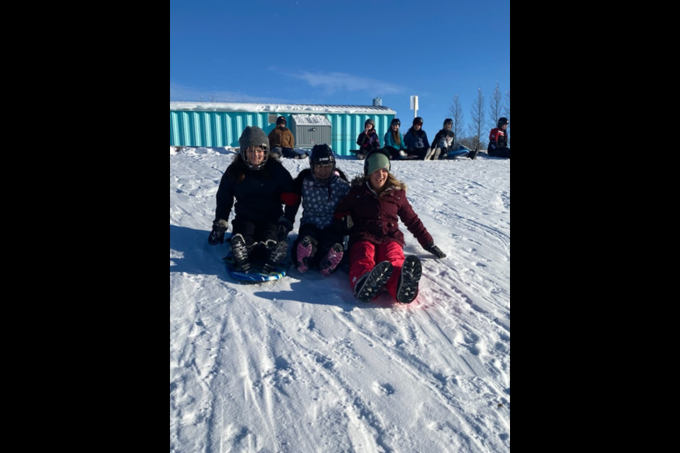 Invermay School started January with outdoor activities, including sledding on the hill outside the school.