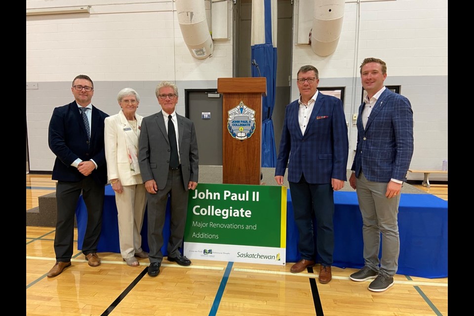 Left to right, Cory Rideout, Adrienne Welter, and Glen Gantefoer, of Light of Christ Catholic School Division, join Premier Scott Moe and Education Minister Jeremy Cockrill  at  John Paul II Collegiate on Sept. 23.