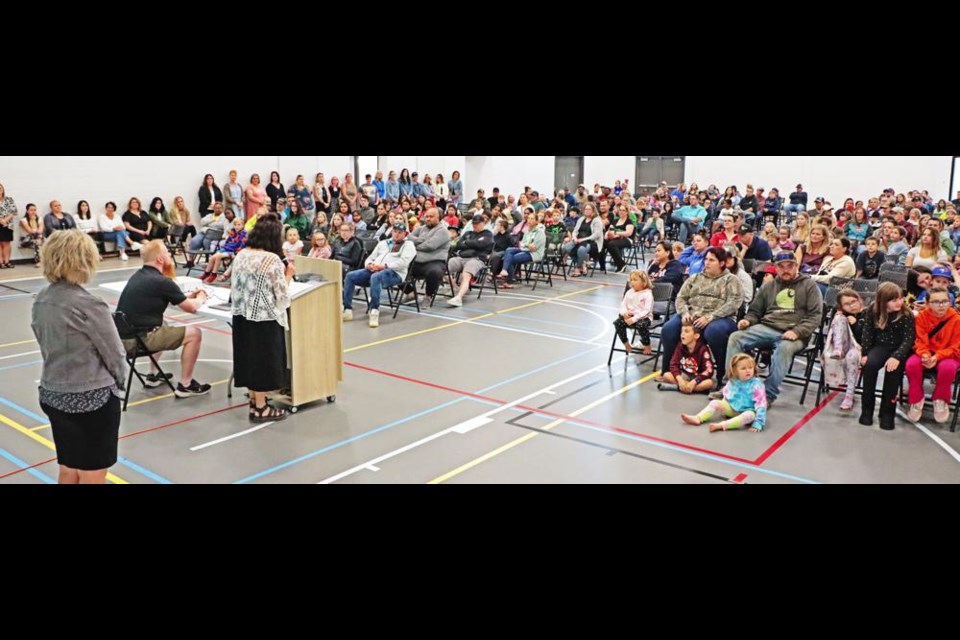 The families of Legacy Park gathered in the gym for staff introductions before visiting classrooms at "Meet the Teacher" night on Wednesday evening.