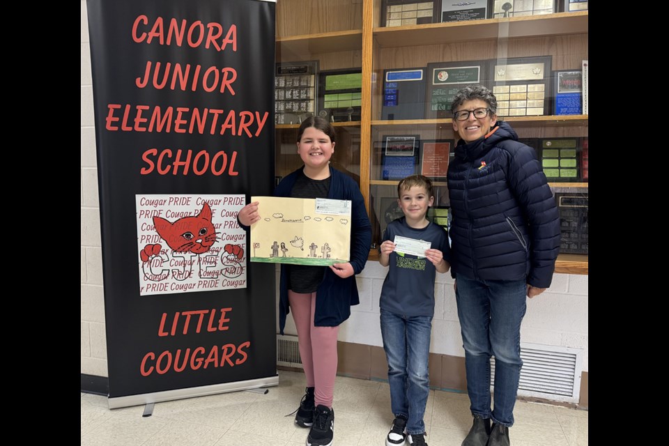 Canora Junior Elementary students who excelled in the 2024 Royal Canadian Legion Remembrance Day Poster Contest were recently rewarded for their achievements. From left, were: Scarlett Jones, Kolson Skibinsky, and Lorri Dennis, Canora Legion representative. Unavailable for the photo was Rayleen Grace Young.
Kolson Skibinsky won first place in the coloured poster category, receiving $100. His poster will go on to compete at the Zones level.
Scarlett Jones won third place in the coloured poster category, with a prize of $50.
Rayleen Grace Young earned third place in the black-and-white poster category, receiving $50.
“CJES is very proud of all students who demonstrate wonderful artistic talents by creating these posters and then entering them into the poster contest,” said Principal Shawna Stangel.
