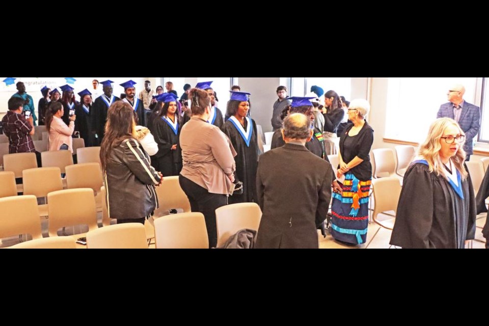 The graduates from the Continuing Care Assistant program in Assiniboia and Weyburn entered at the start of the grad ceremonies on Friday at the Weyburn campus.