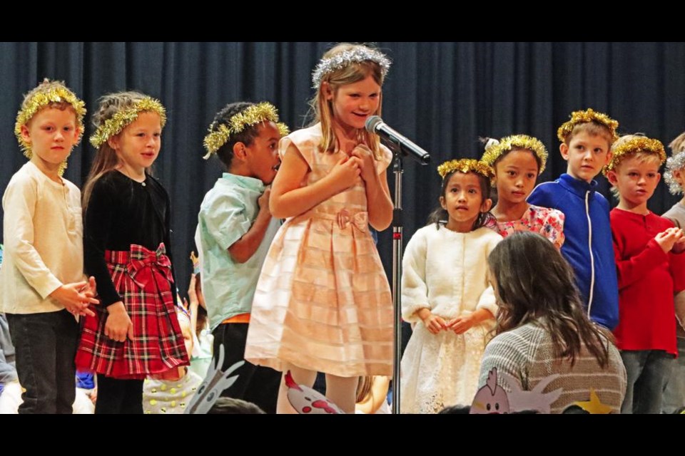 A group of Grade 1 and Kindergarten students did some narration of the Christmas story before singing a song, during the afternoon Christmas performance at St. Michael School on Tuesday.