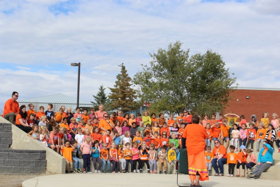 spruce-ridge-orange-shirt