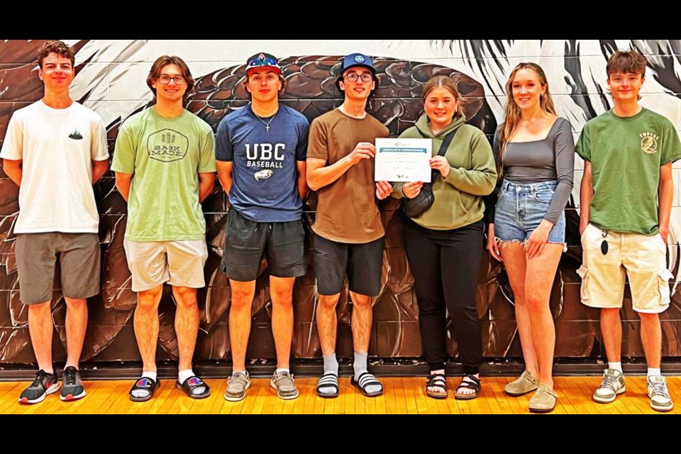 Some of the members of the JA company, Sweets & Treats gathered to receive the certificate as the JA Company of the Year for the province. From left are VP of Finance Wylie Kopec, Co-VP of Sales/Marketing Brasen Sim, VP of HR Keaton Husband, Co-President Hudson Bourassa, and Co-President Jenna Knupp, Co-VP of Sales/Marketing Sophia Jordens, and Assistant Production VP Kail Kater.