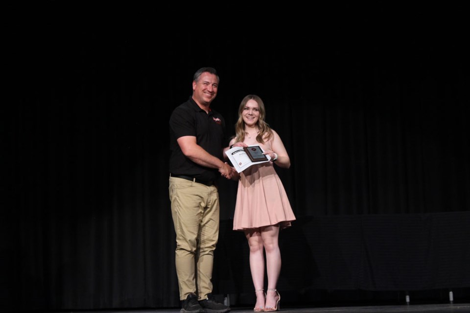 UCHS Principal, Aaron Melnyk, presents Grade 12 student, Kaybree Spendelow, with the senior high "3 Beliefs" award at a special awards ceremony held at the school June 6.