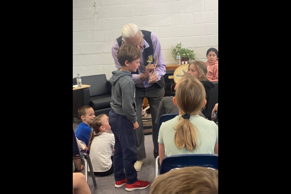 Elder Dr. Winston Wuttunee interacting with students as part of his all-day presentations at Kerrobert Composite School May 24.