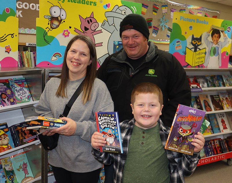 The Book Fair was a popular attraction at the CJES Winter Wonderland Family Afternoon on Dec. 13. It looked like Finn Propp, Grade 2, was finding all kinds of interesting books, and his parents Lindsey and Jeff seemed to be catching some of Finn’s enthusiasm.