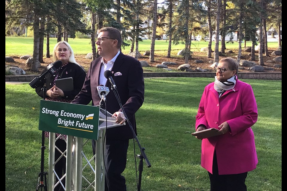 Scott Moe makes a health care announcement alongside Sask Party candidates Sarah Wright of Regina Lakeview and Laura Ross of Regina Rochdale.