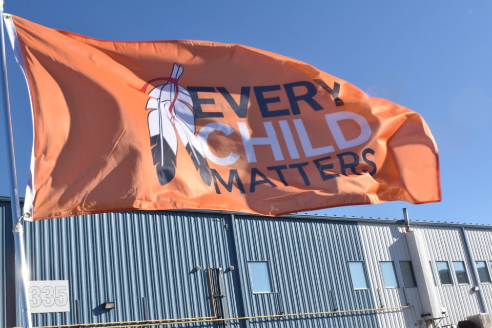 Different flags honouring Orange Shirt Day will be flying as Saskatoon commemorates the National Day for Truth and Reconciliation.