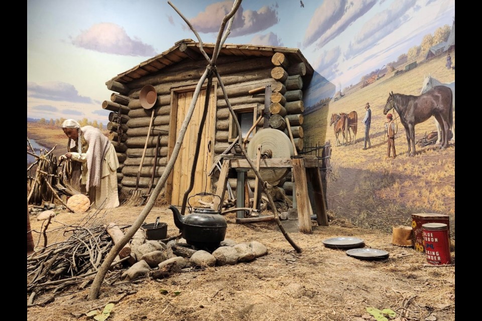 An exhibit shows one of many chores done by First Nations Peoples. 