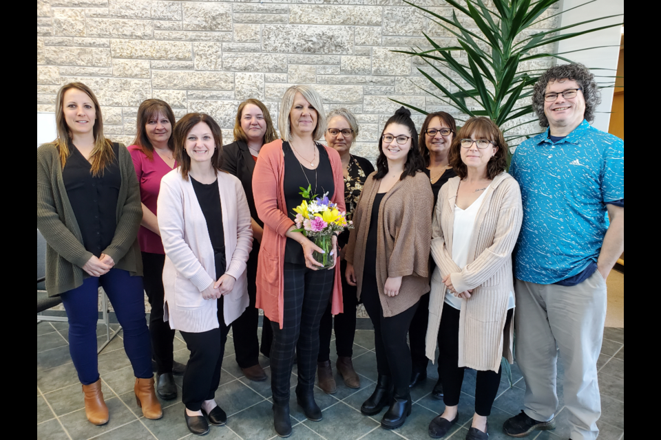 On April 26, Administrative Professionals Day, the Canora Courier presented the administrative professionals at Crossroad Credit Union's Canora branch with a bouquet of flowers. From left are Kristin Olson, Chelsea Rock, Crystal Reine, Lydia Chupik, Leanne Woloshyn, Loralee Antonovitch, Jordan Musey, Sharlene Popoff, Tina Love and Shean Plosz. Each year, the Canora Courier runs a special feature that asks local businesses to place an ad to thank their administrative professionals. This year's was in the April 20 issue. The Courier then selects one lucky business in a draw from among those businesses to receive a bouquet for their staff. Congratulations Crossroad Credit Union.