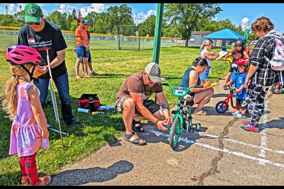 Each bike was checked over for mechanical soundness, before each child went on the course to the other stations for the bike rodeo on July 3.