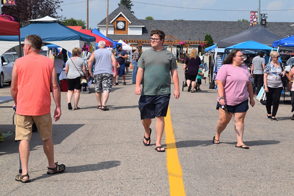 Main Street in Canora was packed with visitors taking in the displays of over 50 vendors for Bloom Fest during the final day of Canora in Bloom on July 21. 