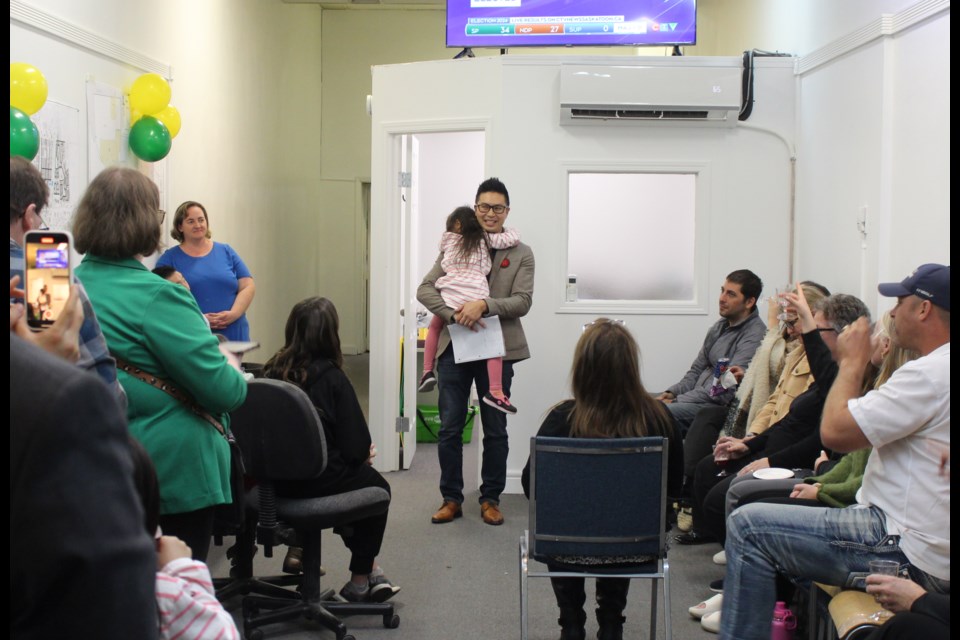 David Chan celebrates with supporters at his campaign office in Yorkton.