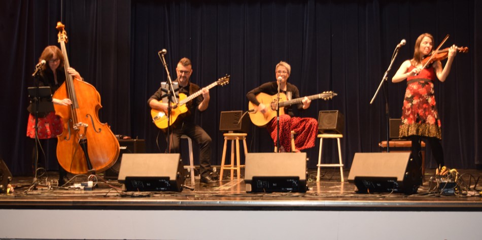 The concert by Christine Tassan et les Imposteures at Canora Composite School on Oct. 18 had just about everyone in attendance snapping their fingers and tapping their feet. From left, were: Patricia Deslauriers, double bass, singer; Francis Tétu, rhythm guitar, singer; Christine Tassan, solo guitar, singer, and Zoé Dumais, violinist, singer.