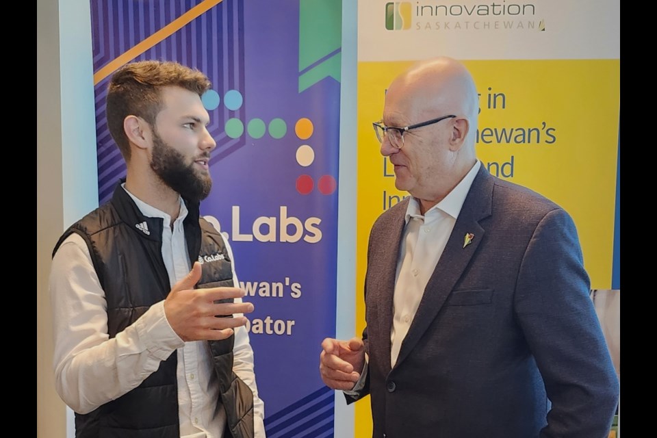 Minister Responsible for Innovation Saskatchewan Warren Kaeding talks with Co.Lab Executive Director Jonathan Lipoth.