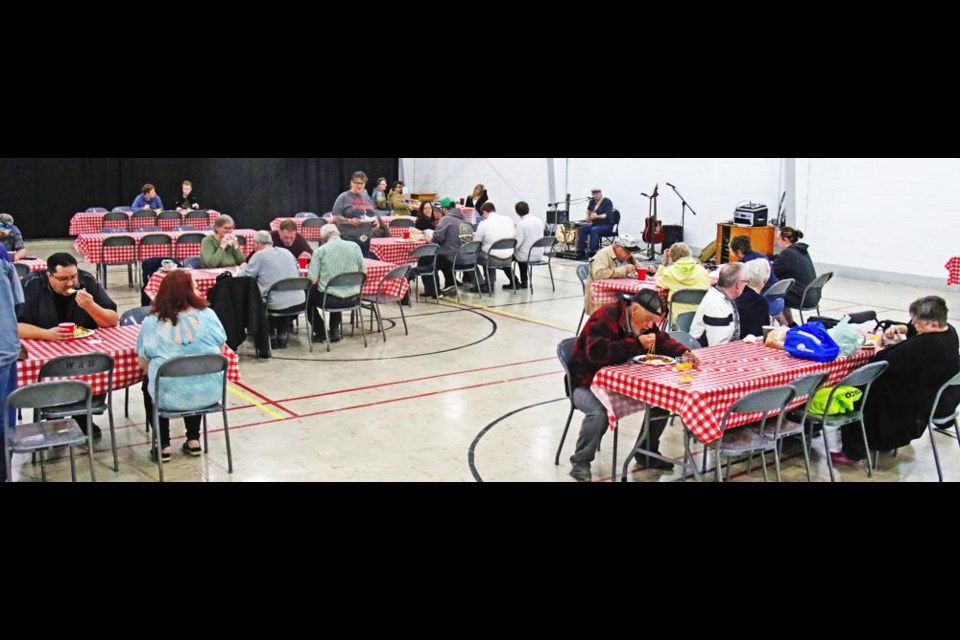 The tables at Knox Hall were mostly filled with Weyburn area residents to take in the community potluck and listen to the live music on Saturday.
