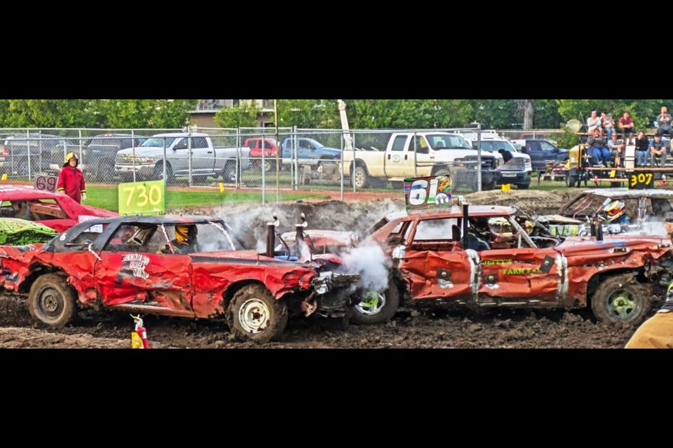 After the opening heat, there were two feature heats held for the "Rumble in the Ring" demo derby on Saturday evening at the Weyburn Fair.