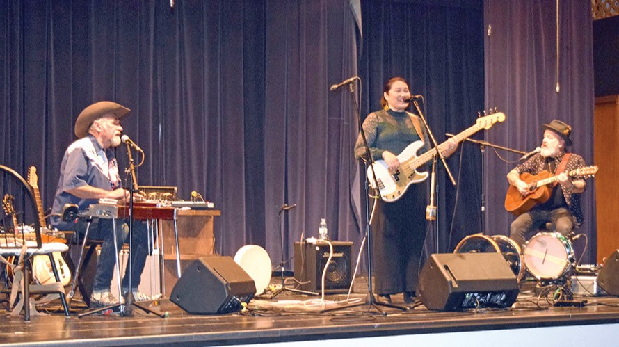 Diyet and the Love Soldiers displayed their wide-ranging musical and vocal talents for an enthusiastic Canora audience on Oct. 26. From left were: Bob Hamilton (vocals, pedal steel, mandolin, electric guitar), Diyet (lead vocals, bass, traditional hand drum) and her husband Robert van Lieshout (vocals, drums and acoustic guitar).