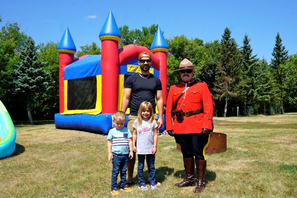 Jake, Mia and Jarren Senchuk along with Constable Kyle Secord with Estevan RCMP Detachment were out at the Rotary Park on Thursday celebrating the RCMP’s 150th birthday.                               