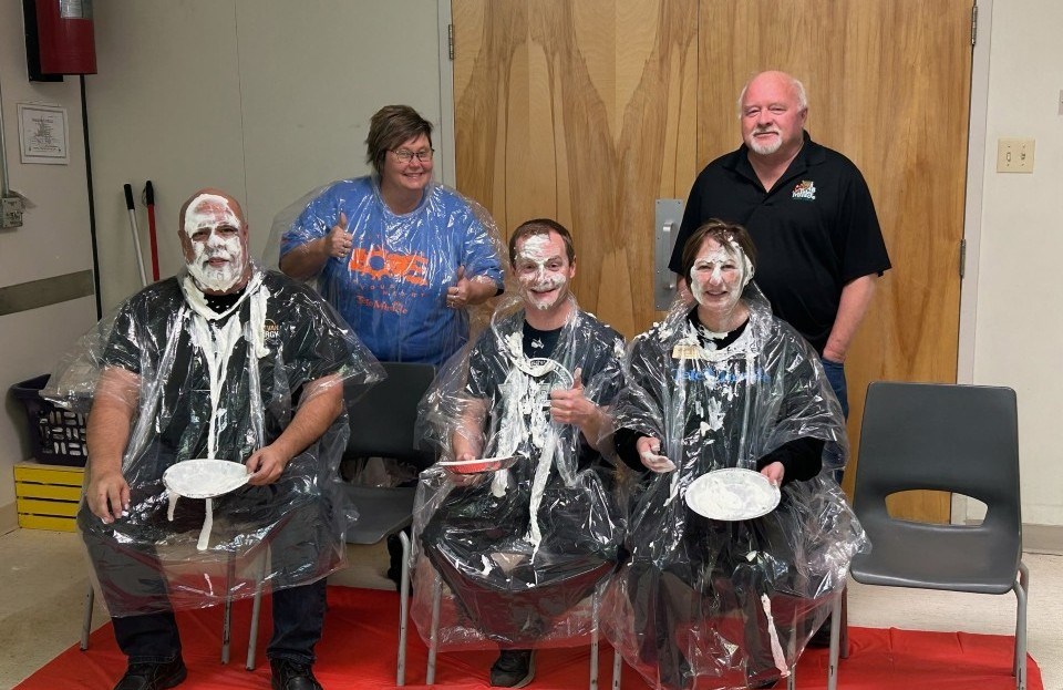 Mayor Tony Sernick, the ECS principal, James Jones, lifetime Kinsmen member and city councillor Dave Elliott, and two Kinette members, Susan Colbow and Raylene Fieber, partook in Pie in the Face fundraiser. 