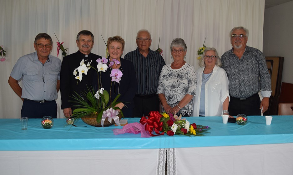 At the head table for the Father Joakim Rac farewell/retirement social, from left, were: Dave Popowich, Father Rac and his wife Zlatica, Ernie and Marlene Kozak, and Joan and Danny Rakochy.