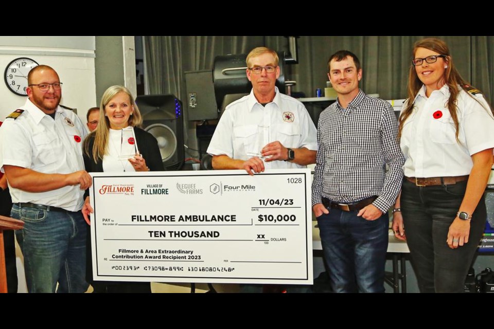  Vickie Procyk and Russ Leguee accepted the award funds of $10,000 on behalf of the Fillmore Ambulance, as they received the Fillmore and Area Contribution Award for 2023. From left are Chris Procyk, Vickie Procyk, Russ Leguee, Jake Leguee and Sarah Leguee.