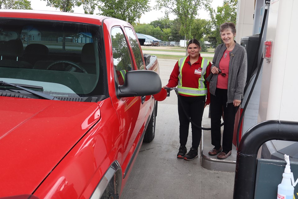 Evelyn Dergousoff stopped in at Gateway Co-op in Canora to have her tank filled by Latifah Severight during Fuel Good Day on Sept. 17. For every litre of fuel pumped during the day, 10 cents is being donated towards local community groups, including: Ukrainian Catholic Ladies, Canora & District Benevolent Fund Inc., #606 Harvard air cadets Preeceville and the Sturgis Arena Board. In addition, $1 from each Big Cool Slushie or Co-operative Coffee from Canora and Preeceville C-Stores was donated.