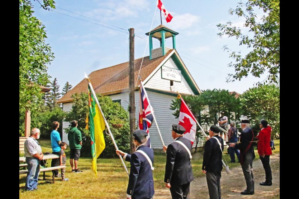 The Weyburn Legion Colour Guard, and retired RCMP officer Pete Broccolo led the opening ceremonies at Heritage Village Days on Friday, with the raising of the flag at the school and singing O Canada.